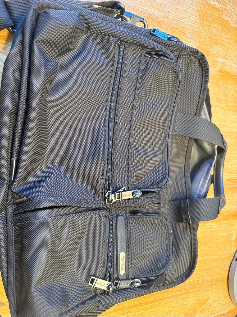 This Tumi Alpha black ballistic nylon expandable laptop business briefcase